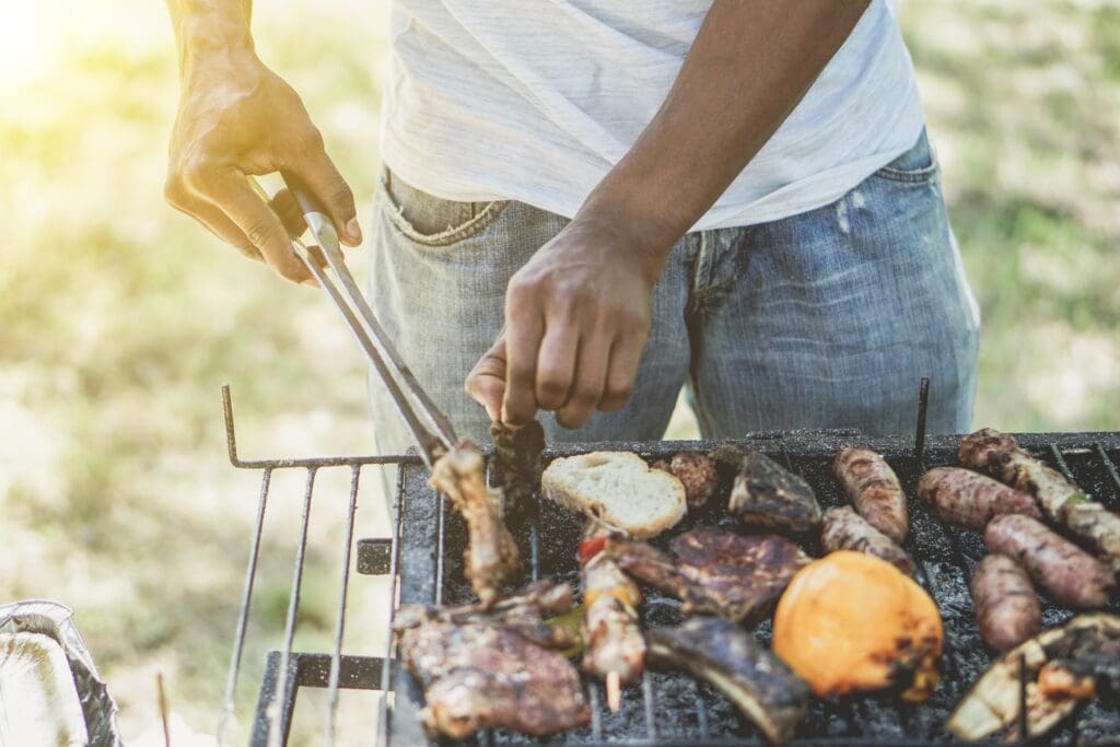 A man grilling food