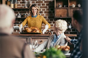 Woman with a Thanksgiving turkey